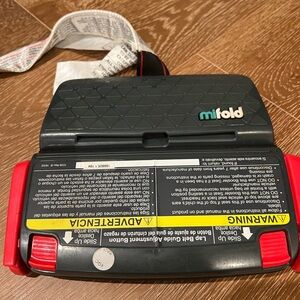 Mifold travel booster seat